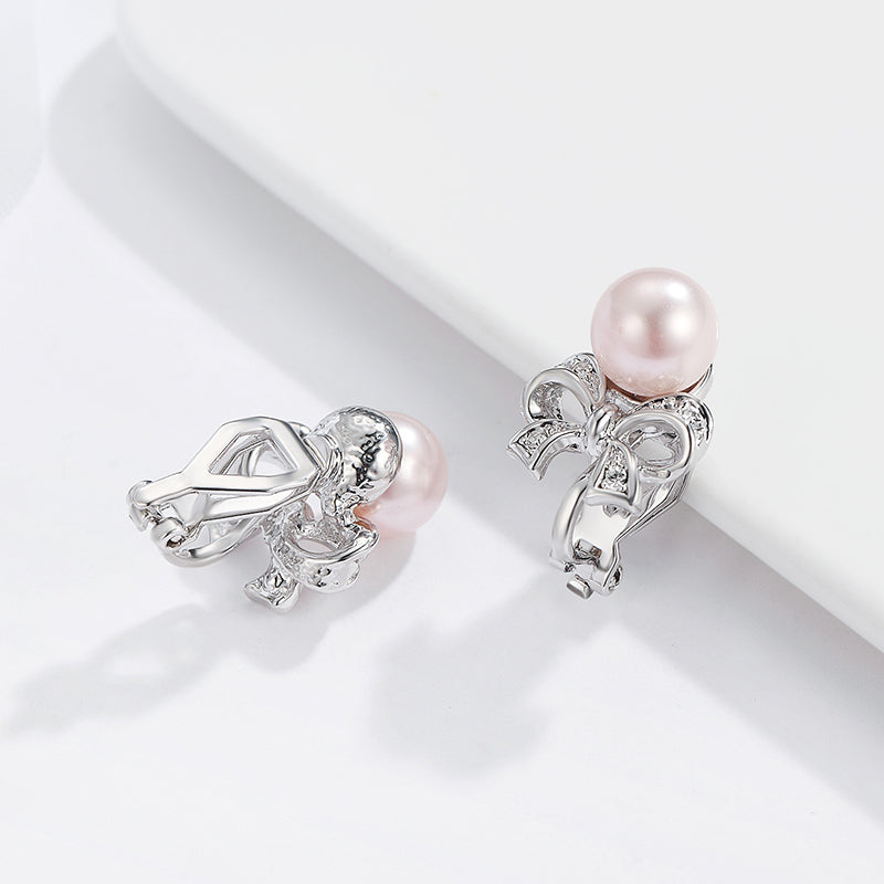 ‌Pearl-studded bow earring‌